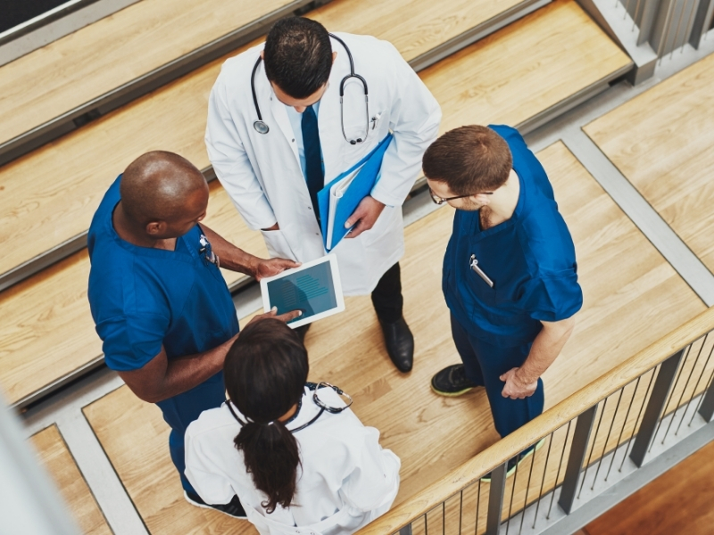 Healthcare professionals discussing a patient's case